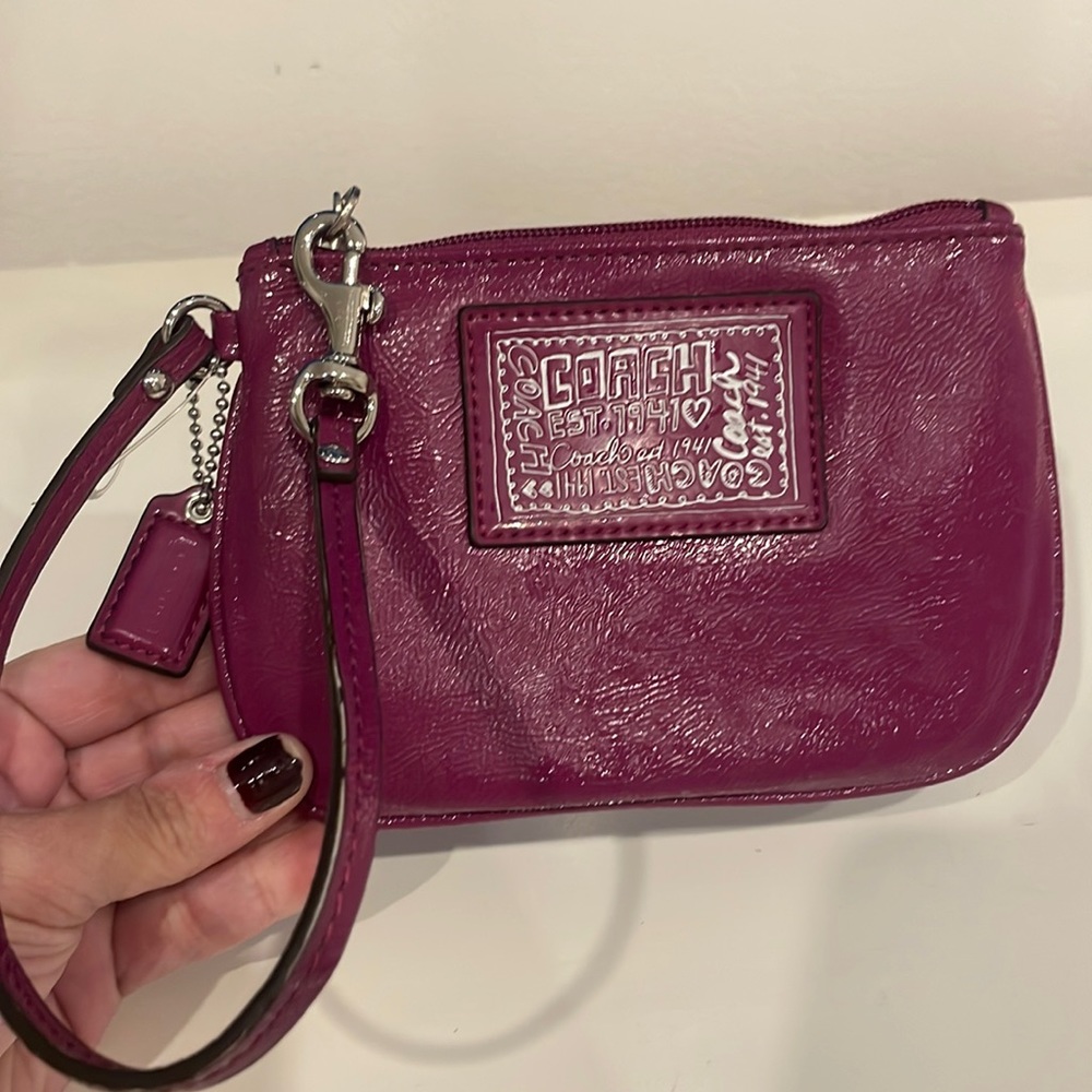 Coach Daisy Liquid Gloss Small Wristlet-  in color Berry